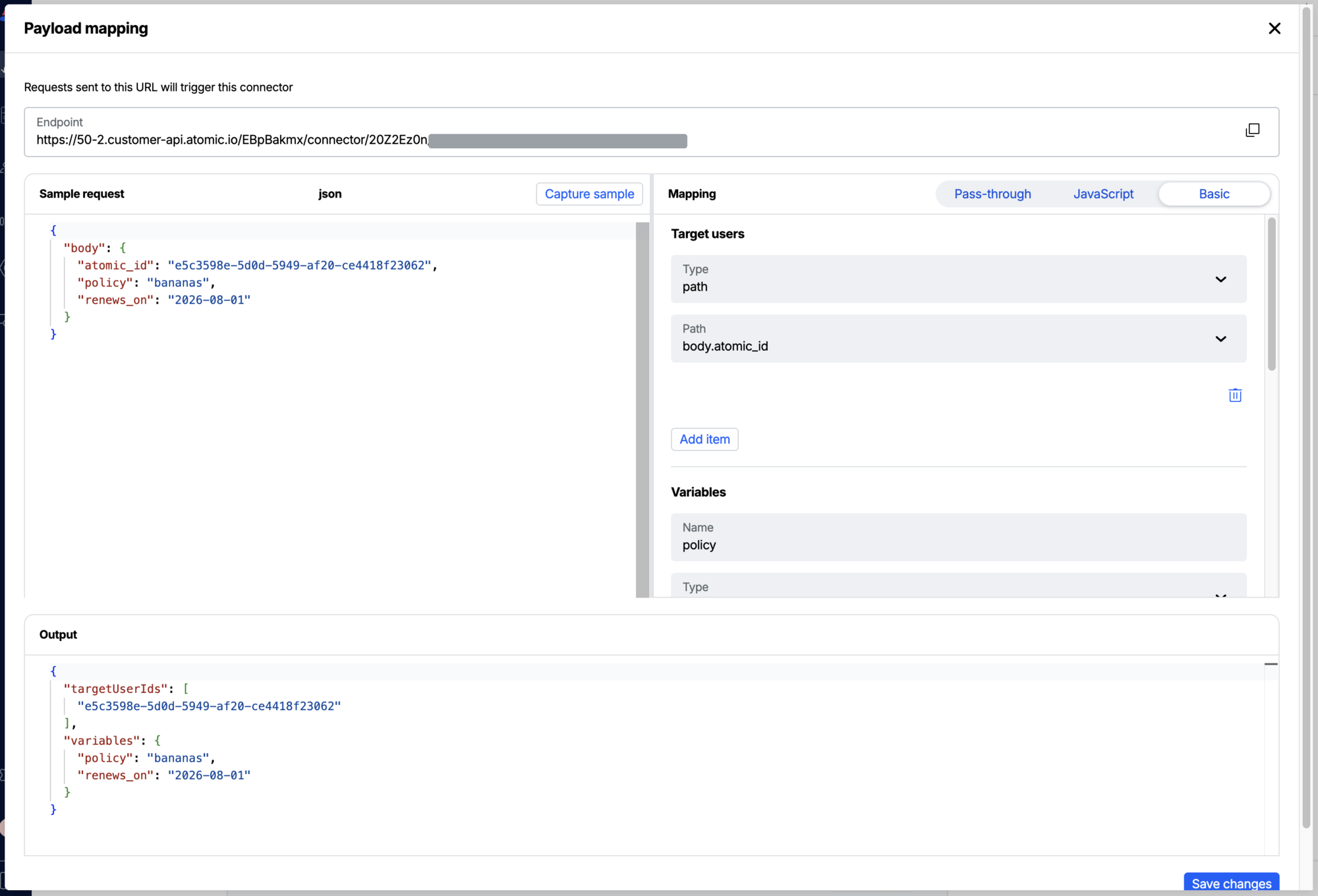 The Atomic payload mapping screen, showing a captured Customer.io sample request on the left, a Basic mapping targeting body.atomic_id on the right, and an Output panel with the resulting targetUserIds and variables.